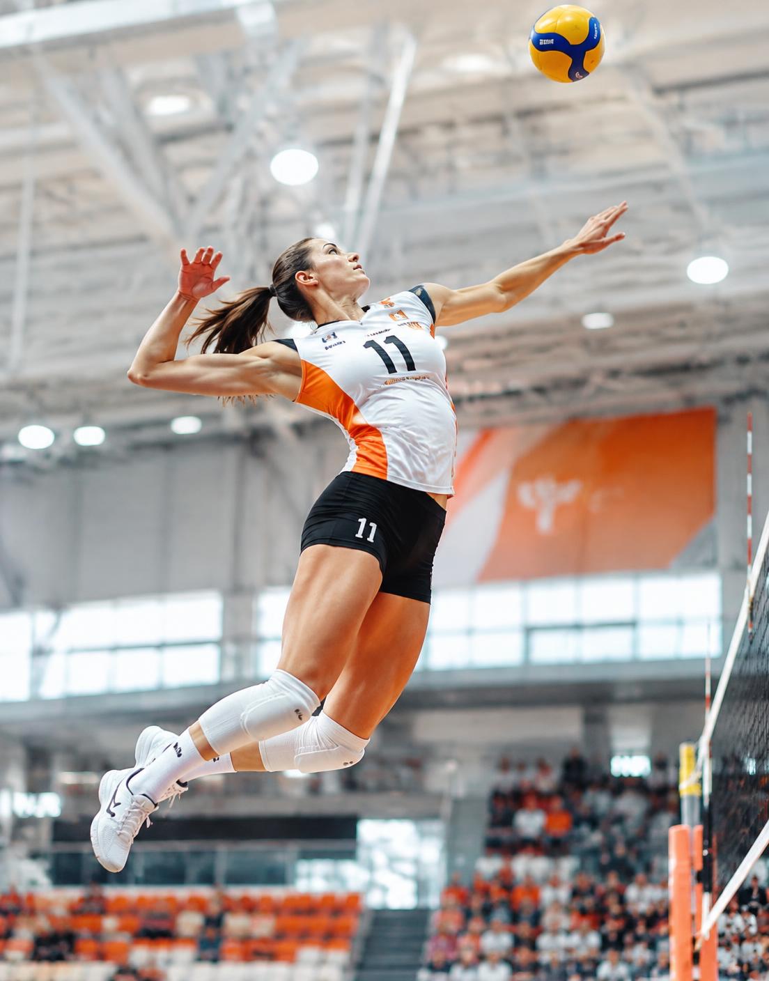 Volleyball player spiking